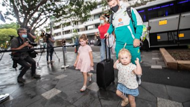 David Warner walks into the team hotel with his family.