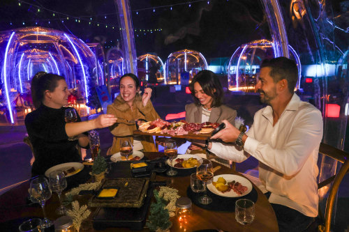 Inside the Raclette Igloo atop Broadway Shopping Centre.