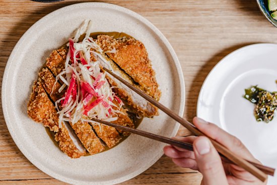 Chicken katsu with Japanese curry sauce and slaw is paired with pale ale.