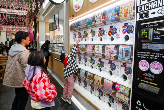 A wall of vending machines at Gacha Cafe.