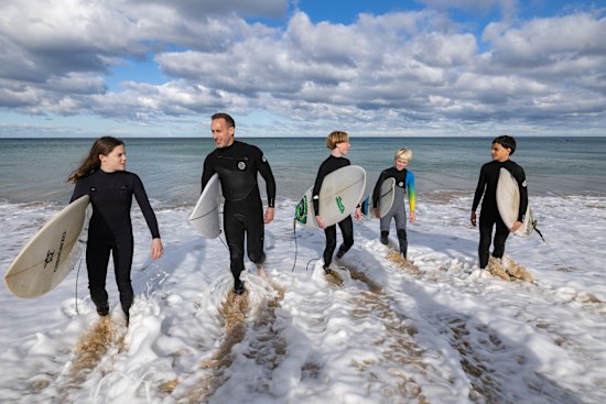 Surf Coast Secondary College principal Shane Elevato with students (from left) Maggie O’Brien, Will Wyllie, Nainoa Le Nevez and Thorson Crawley.