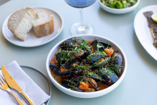 Australian mussels in an ’nduja spiked tomato and fermented chilli butter at The Basin Dining Room.