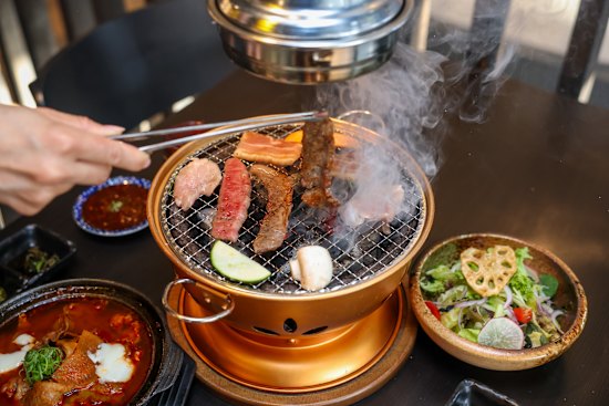 The assorted tasting plate, grilled at the table.