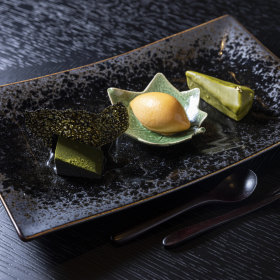 Matcha dessert with gold leaf.