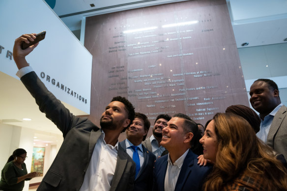 Florida Democrat Maxwell Frost takes a selfie with current and incoming Congressional Progressive Caucus members in Washington.