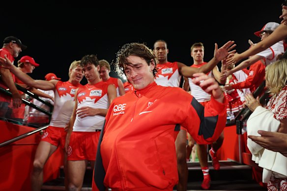 Errol Gulden walks down the race after being injured against Brisbane.