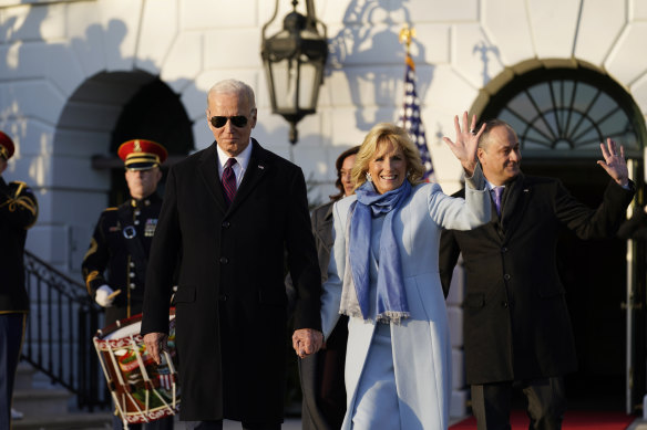 US President Joe Biden and his wife, Jill, arrive to sign the bill. 