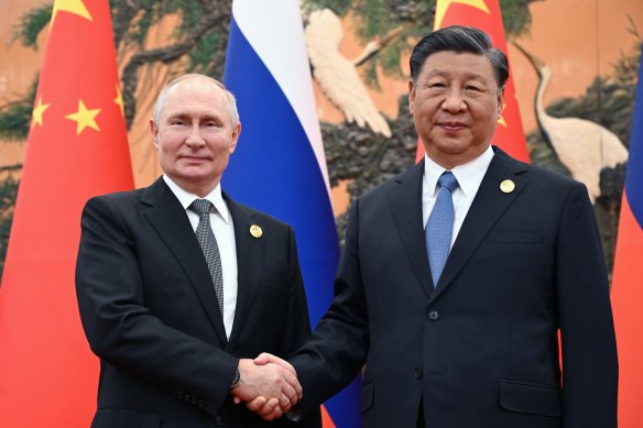 Chinese President Xi Jinping, right, and Russian President Vladimir Putin pose for a photo prior to their talks on the sidelines of the Belt and Road Forum in Beijing, China, on Wednesday, October 18, 2023. 
