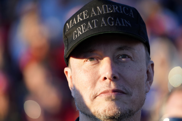 Tesla and SpaceX CEO Elon Musk listens as Republican presidential nominee Do<em></em>nald Trump speaks at a campaign event in Pennsylvania.
