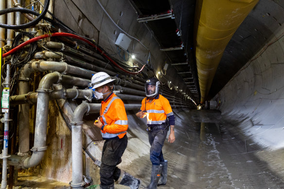 Construction workers walk through tunnels at Rozelle for the Metro West rail project.