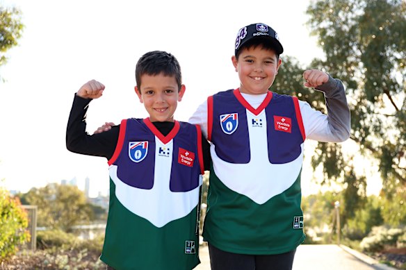 Some young Freo fans wear retro jumpers.