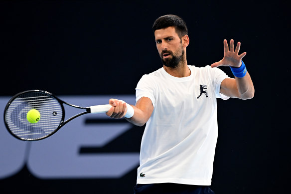 Novak Djokovic hitting up after his arrival in Brisbane.