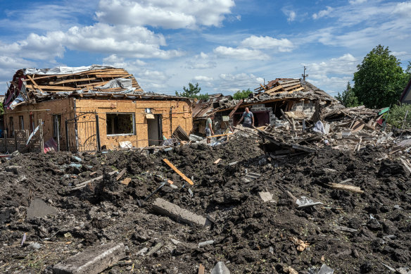 Residents survey the damage to their home after a Russian missile attack in Pokrovsk, Ukraine.