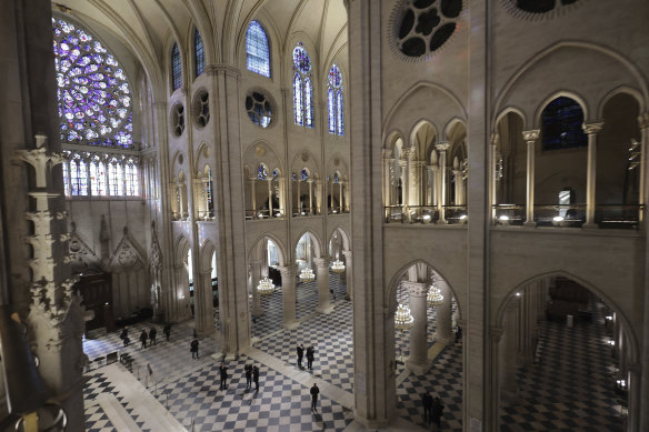 People stroll in Notre-Dame ahead of its reopening.