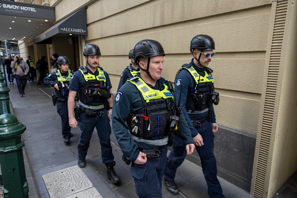 A large police presence was outside the press conference in case protesters gathered.