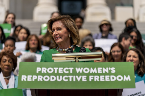 US House Speaker Nancy Pelosi, accompanied by female House Democrats, speaks at an event ahead of the vote on the Women’s Health Protection Act at the Capitol in Washington.