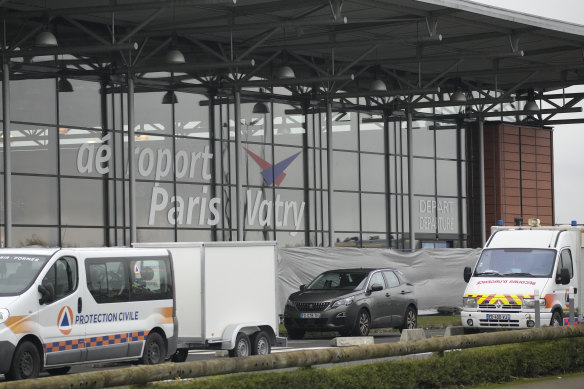 Rescue vehicles park outside the Vatry airport, eastern France.