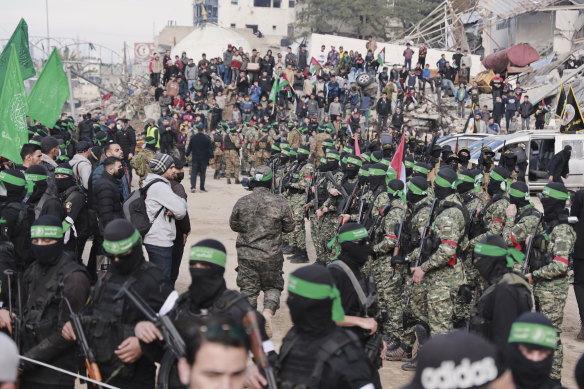 Hamas fighters in central Gaza ahead of the release of the four women. 