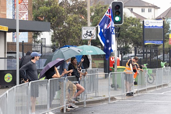 People gather along Bondi’s Campbell Parade to welcome Herzog.