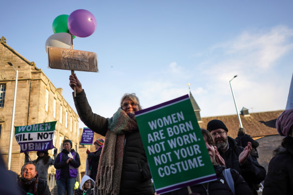 Protesters against the reform outside the Scottish Parliament in December. 