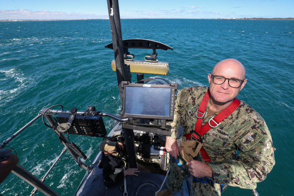 Captain Neil Steinhagen, commander of the US Navy’s Submarine Squadron 15, atop USS Minnesota.