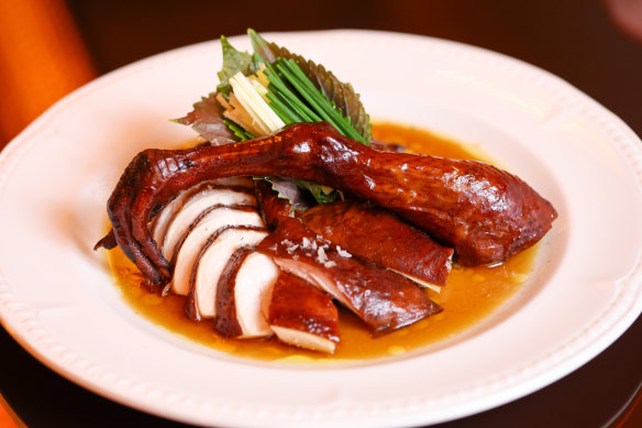 Go-to dish: Soy-poached chicken with shiso broth. 