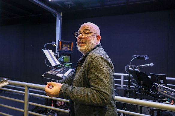 Music director Nigel Ubrihien leads the band that creates the wall of sound that powers the show.