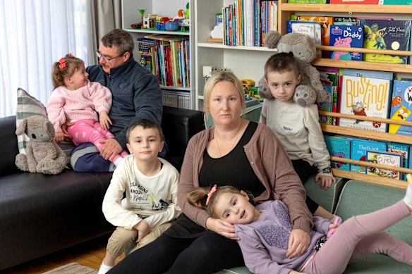 Adam Weeks and Cara Delarue with their four children Ivory, 3, Elijah, 7, Madelyn, 4, and Kohen, 5.