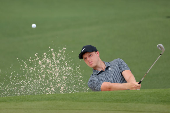 Cameron Davis of Australia plays a shot from a bunker. 