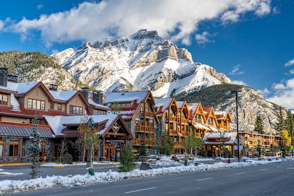 Banff Avenue against the backdrop of the snow-covered Cascade Mountain.