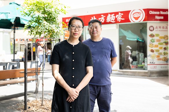 Susanna Chen and Xinjiang Sun in front of Chinese Noodle House, Haymarket. 