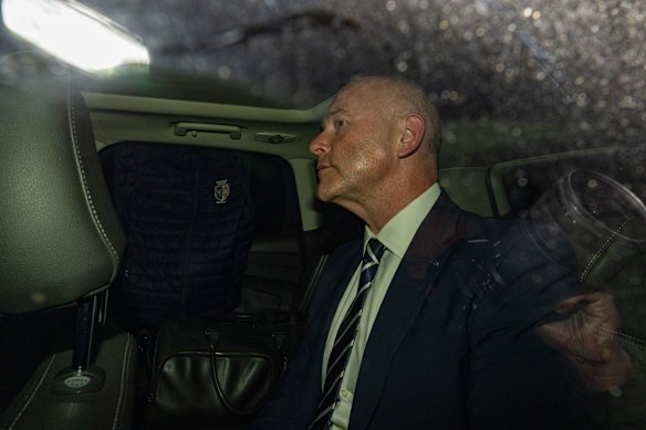 One of the more elusive subjects: Catholic Schools NSW chief executive Dallas McInerney leaving the ICAC via car on August 13.
