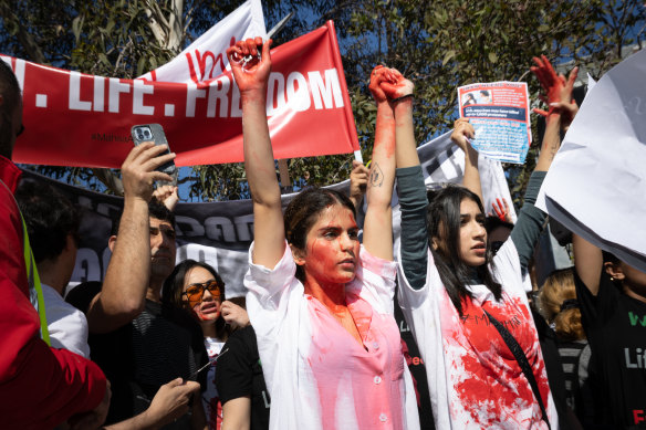 Protestors gathered at Federation Square on Saturday to rally against the Iranian government.