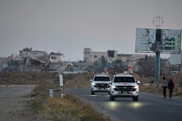 Red Cross vehicles carrying American-Israeli hostage and soldier Edan Alexander leave the Gaza Strip after he was handed over to the organisation.