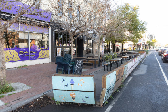 These parklets in Lygon Street, Brunswick East, will be torn down, as the council introduces fees to bring them back.