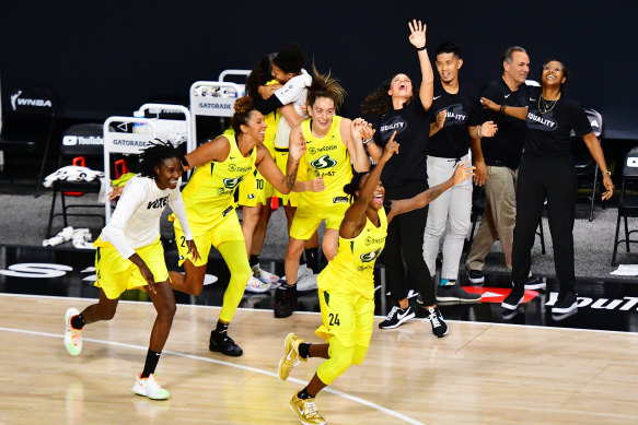 The Seattle Storm celebrate their championship win.