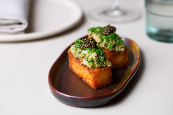 Crab toast with spanner crab meat, seaweed butter, avocado and N25 Kaluga caviar. 