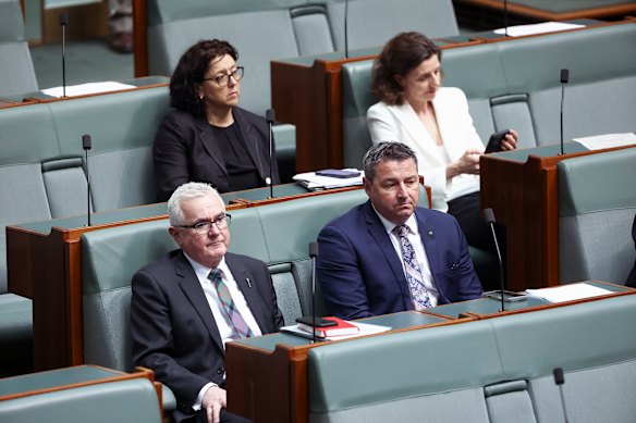 Pat Conaghan (lower right) crossed the floor and sat with the crossbench during debate of the Gambling Reform Bill. 