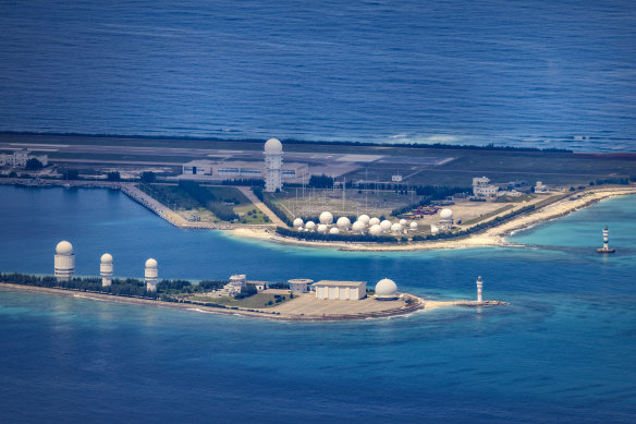 An airfield, buildings, and structures are seen on the artificial island built by China in the South China Sea. China has progressively asserted its claim of ownership over disputed islands in the South China Sea by artificially increasing the size of islands, creating new islands and building ports, military outposts and airstrips. 