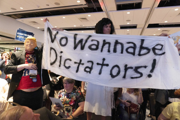 Libertarian delegates jeer Republican presidential candidate and former president Donald Trump as he speaks at the Libertarian National Convention at the Washington Hilton.