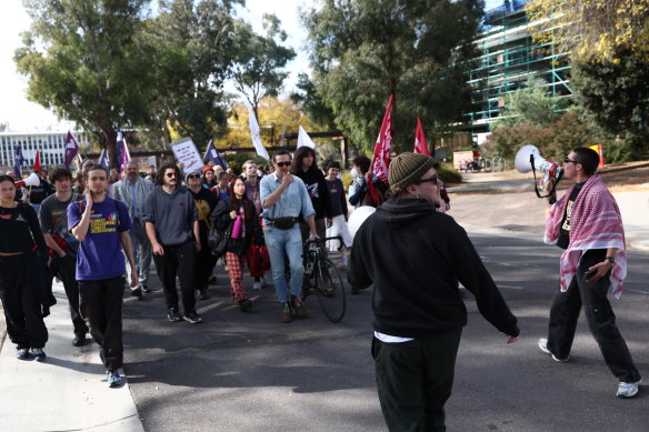 Protesters from the pro-Palestinian encampment at the Australian National University (ANU) in Canberra march to the chancellor’s office earlier this month. The ANU has directed that the encampment be disbanded.
