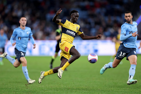 Garang Kuol will watch his brother Alou Kuol, pictured, represent the Central Coast Mariners in Saturday’s A-League final. 