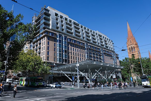 The new roof at the entrance to the City Hall station in City Square is at the center of a compensation dispute.