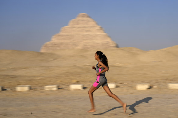 A barefoot runner participates in the 10km Saqqara Pyramid Race at the site of the Step Pyramid of Djoser in Saqqara, southwest of Cairo, Egypt, in February.