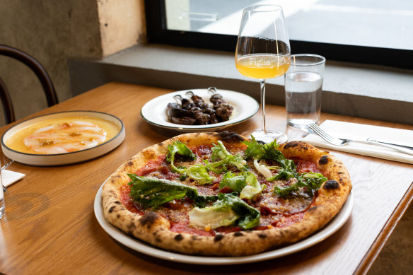 Figlia’s lingua pizza of ox tongue, roasted garlic, pecorino and endive.