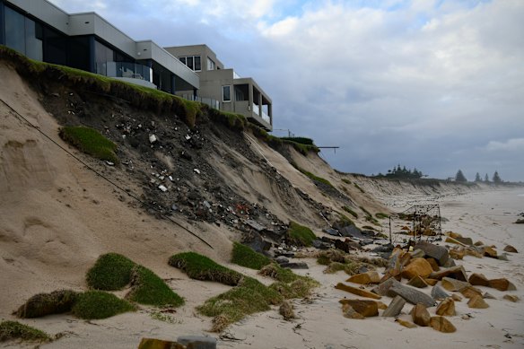 A Central Coast beach still damaged in May 2025, a month after an East Coast Low caused drastic erosion along the coastline from Wamberal to The Entrance.