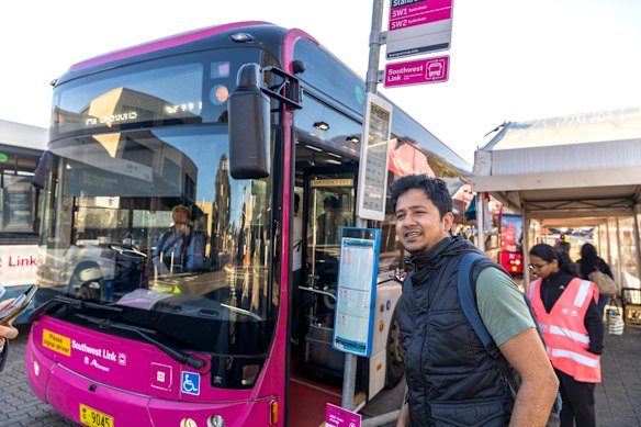 Uzair Saeed boards a pink Southwest Link bus from Bankstown station. 