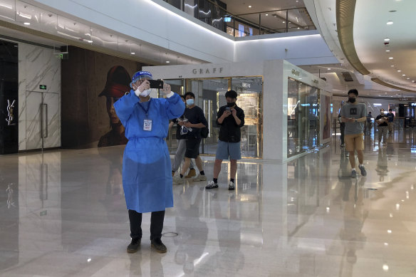 An almost deserted shopping mall in Shanghai on Sunday.