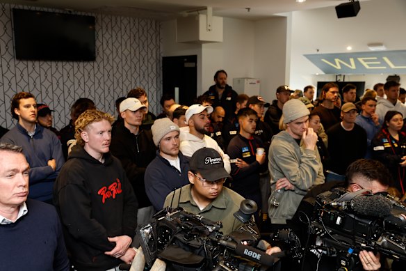 Melbourne players at Simon Goodwin’s farewell press conference.