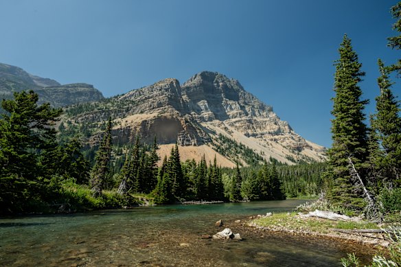 Sunshine transforms the trail into a glorious romp past cold, clear glacial streams.